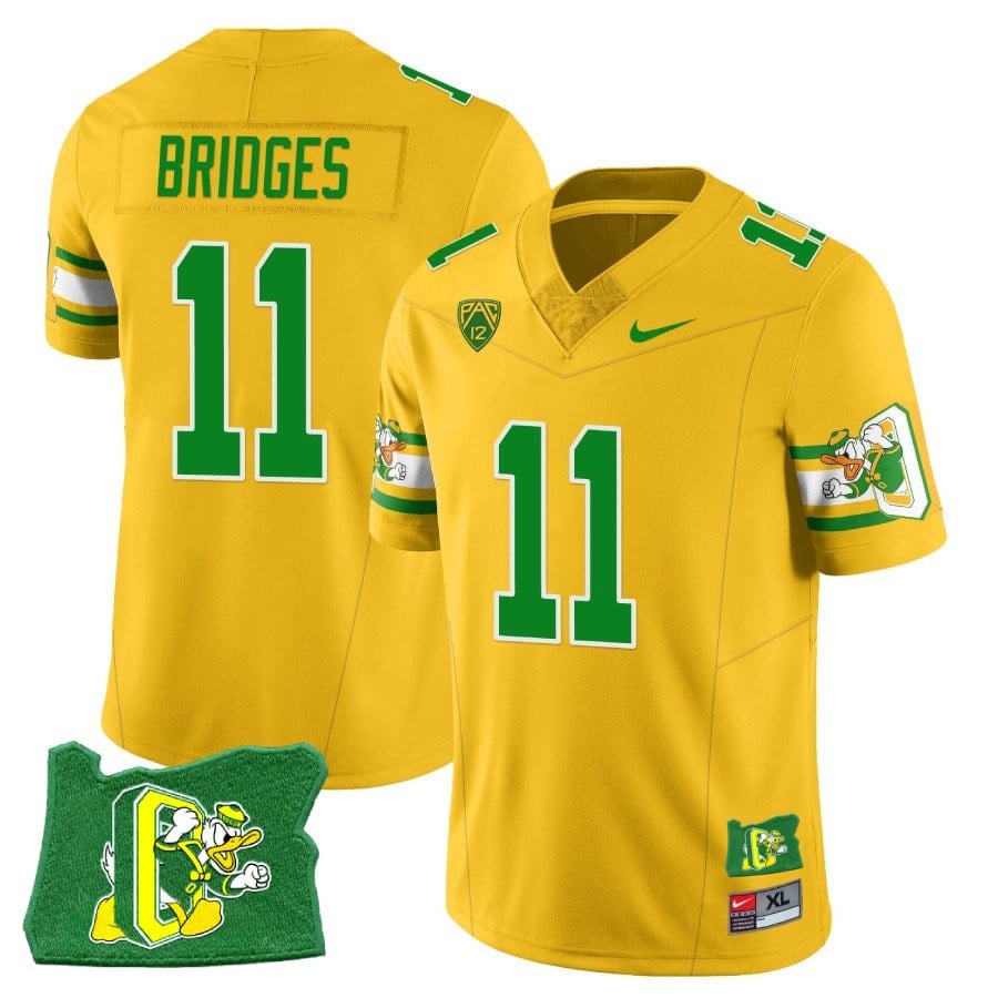 Menâs Oregon Ducks âMighty Oregonâ Throwback Football Stitched Jersey â Oregon State
